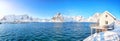 Fantastic panorama of Reinefjorden on Toppoya island with Festheltinden and Olstinden peaks