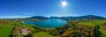 Fantastic panoramic view over the bavarian lake Tegernsee in autumn with fall colors, made by a drone. Royalty Free Stock Photo