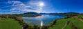 Fantastic panoramic view over the bavarian lake Tegernsee in autumn with fall colors, made by a drone. Royalty Free Stock Photo