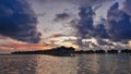 Fantastic purple clouds in the sky after sunset. Royalty Free Stock Photo