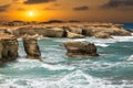 Fantastic seascape on the background of orange sunset. Cyprus