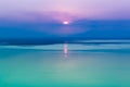 Fantastic seascape with cool sunset background with reflection o