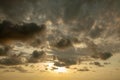 Fantastic sky, dramatic sunset, beautiful natural background. Setting sun illuminates the clouds Royalty Free Stock Photo