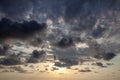 Fantastic sky, dramatic sunset, beautiful natural background. Setting sun illuminates the clouds Royalty Free Stock Photo