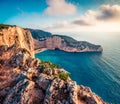 Fantastic spring voew of the Shipwreck Beach. Colorful sunset on the Ionian Sea, Zakinthos island, Greece, Europe. Beauty of