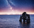 Fantastic starry sky and the Milky Way on the east coast of the peninsula Vatnsnes in the north of Iceland. Royalty Free Stock Photo