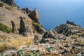 Fantastic stone pillars in the Karadag reserve, Crimea. View from the top of mountain in sanny day of golden autumn