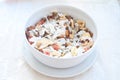 Fantastic stuffed porcelain cup of cereal , fruit and coconut f