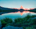 Fantastic summer sunrise ob Stellisee lake. Splendid morning view of Matterhorn Monte Cervino, Mont Cervin in Swiss Alps, Royalty Free Stock Photo