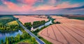 Fantastic summer sunset on the Ternopil outskirts with two lakes and asphalt road. Royalty Free Stock Photo