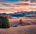 Fantastic sunrise in Alpe di Siusi village. Dramatic autumn scene of Dolomite Alps, Ortisei locattion, Italy Royalty Free Stock Photo