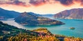 Fantastic sunrise on Marone town with Monte Isola island, Province of Brescia, Italy, Europe. Aerial summer view of Iseo lake. Tra Royalty Free Stock Photo