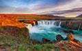 Fantastic sunrise scene of powerful Godafoss waterfall Royalty Free Stock Photo