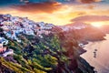 Fantastic sunrise view of Santorini island. Picturesque spring scene of famous Greek resort Oia, Greece, Europe. Beautiful world o Royalty Free Stock Photo