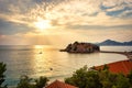 Sunset over Sveti Stefan islet in Montenegro Royalty Free Stock Photo