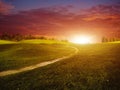 Fantastic sunset over summer green hills Royalty Free Stock Photo