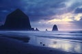 Fantastic sunset at Reynisfjara Beach, Iceland, Europe, Cannon Beach Dusk Solitude. Evening twilight at Haystack Rock in Cannon