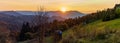 Fantastic sunset in a small mountain village. Panoramic view. Royalty Free Stock Photo