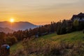 Fantastic sunset in a small mountain village. Panoramic view. Royalty Free Stock Photo