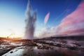 Fantastic sunset Strokkur geyser eruption in Iceland Royalty Free Stock Photo