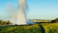 Fantastic sunset Strokkur geyser eruption in Iceland Royalty Free Stock Photo