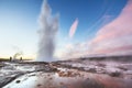 Fantastic sunset Strokkur geyser eruption in Iceland. Fantastic colors Royalty Free Stock Photo