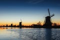 Fantastic sunset traditional Dutch windmills canal in Rotterdam.