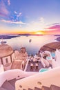 Fantastic sunset view of Santorini island. Picturesque spring summer sunset sunrise famous Oia or Fira, Greece, Europe. Traveling Royalty Free Stock Photo