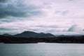 Fantastic view of Iceland in spring. Bright twilight of early white nights over the dreamy landscapes with blue water Royalty Free Stock Photo