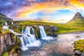 Fantastic view on Kirkjufellsfoss waterfall  near Kirkjufell mountain at sunset Royalty Free Stock Photo