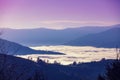 Mountain ridge above the clouds Royalty Free Stock Photo