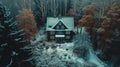 Fantastic winter landscape with glowing wooden cabin in snowy forest. Cozy house in Carpathian mountains. Royalty Free Stock Photo