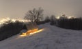 Fantastic winter landscape with glowing wooden house Royalty Free Stock Photo