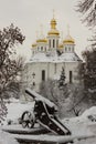 Fantastic winter landscape with old cannon and Church of St. Catherine in historical center of Chernihiv, Ukraine Royalty Free Stock Photo