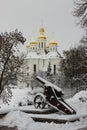 Fantastic winter landscape with old cannon and Church of St. Catherine in historical center of Chernihiv, Ukraine Royalty Free Stock Photo