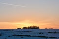 Fantastic winter landscape during sunset. colorful sky glowing by sunlight. Dramatic wintry scene. snow covered trees Royalty Free Stock Photo