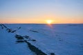 Fantastic winter landscape during sunset. colorful sky glowing by sunlight. Dramatic wintry scene. snow covered trees Royalty Free Stock Photo