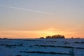 Fantastic winter landscape during sunset. colorful sky glowing by sunlight. Dramatic wintry scene. snow covered trees Royalty Free Stock Photo