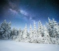 Fantastic winter meteor shower and the snow-capped mountains. Ca Royalty Free Stock Photo