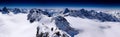 Fantastic winter mountain panorama with a view of the high peaks and glaciers of the Silvretta mountains in the Swiss Alps on a be Royalty Free Stock Photo