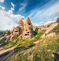 Fantastic world of Cappadocia. Stunning summer view of Uchisar Castle. Sunny morning scene of famous Uchisar village, district of Royalty Free Stock Photo