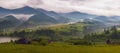 Amazing view of the mountain village Dzembronya foggy morning in the mountains in summer.