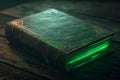 Fantasy ancient leather book with glowing mystery green pages Royalty Free Stock Photo