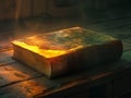 Fantasy ancient leather book with glowing yellow cover Royalty Free Stock Photo