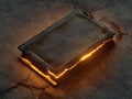 Fantasy ancient leather book with glowing yellow pages Royalty Free Stock Photo