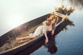 Fantasy art photo of a beautiful lady lying in boat Royalty Free Stock Photo