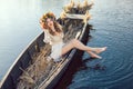Fantasy art photo of a beautiful lady lying in boat Royalty Free Stock Photo