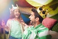 Fantasy, child dress up and dad with princess fun in a bedroom fort with costume, girl and papa together. Play castle