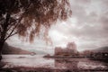 Fantasy colors panorama of Eilean Donan castle, Dornie, Scotland Royalty Free Stock Photo