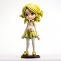 Fantasy Doll Toy Girl With Lime Hair - Manga-inspired Maquette Figurine Royalty Free Stock Photo